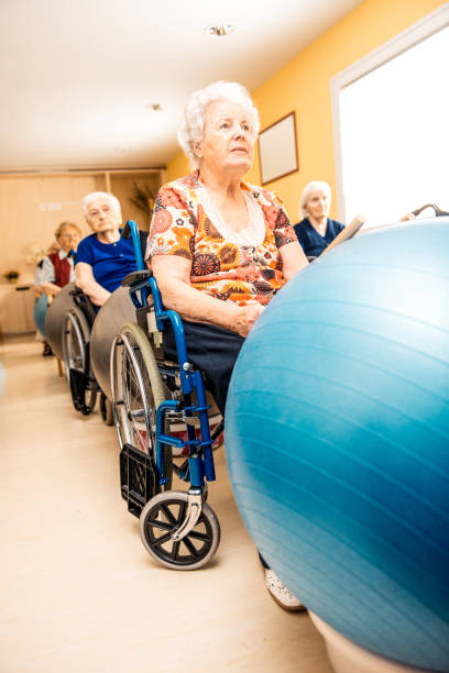 istock Seniors Having Physical Therapy In The Retirement Home 653191380