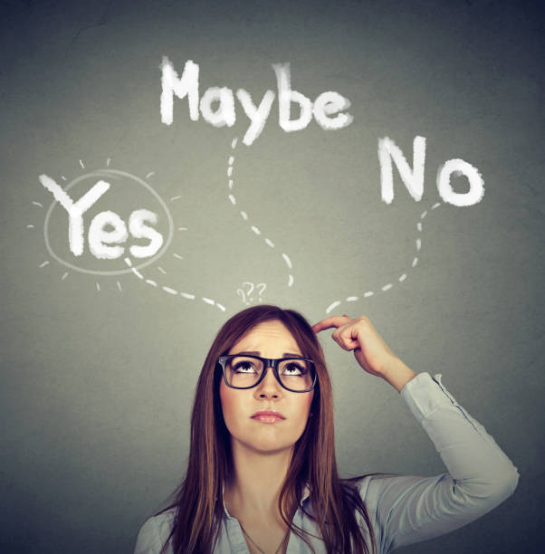 istock Yes Maybe or No? Thoughtful woman 653194330