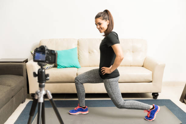 istock Fitness blogger demonstrating an exercise 653196180