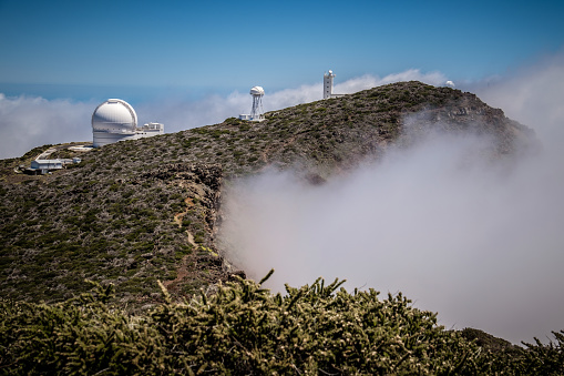 Telescopes on Roque de los Muchachos, La Palma, Spain. Above the clouds, overlooking Caldera de Taburiente National Park.