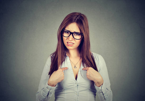 istock annoyed woman asking you talking to me? 653198906