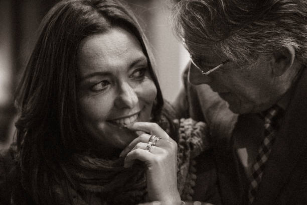 istock A second chance... First romantic evening in a cafe for a mature couple after some years of solitude. The woman is acting in shyer manner than the man. 653199056