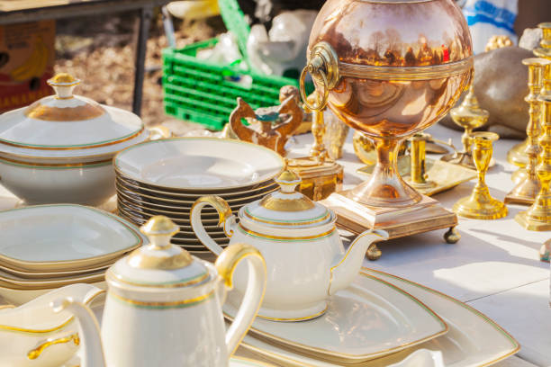 istock China and  glassware at an outdoor second hand market. 653201918