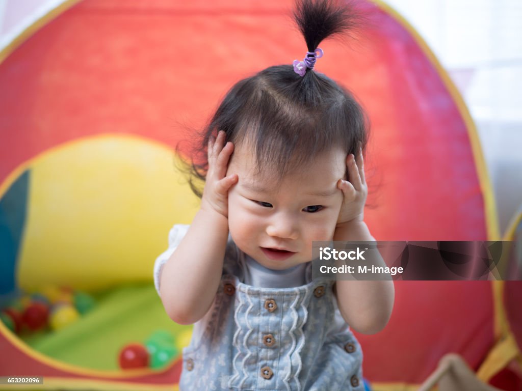 frustrating baby girl close up frustrating baby girl Baby - Human Age Stock Photo