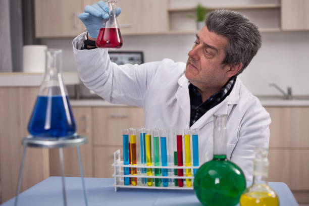 istock senior scientist researching in laboratory 653208220