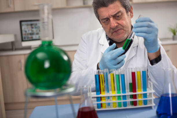 istock senior scientist researching in laboratory 653208528