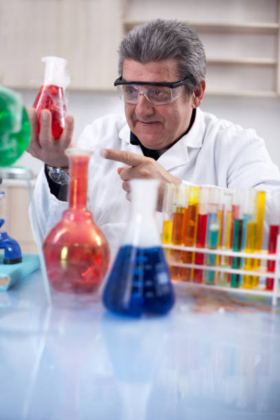 istock senior scientist researching in laboratory 653209058