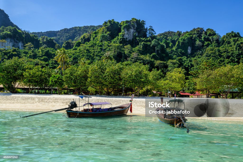 Traditional Thai two boat on the beach of Phi Phi island in Thailand Asia Stock Photo