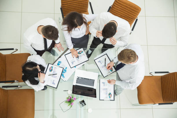 istock professional business team developing a new financial strategy of the company at a work location in a modern office 653225156
