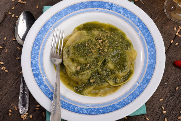istock dish of ravioli with basil and pine nuts 653227358