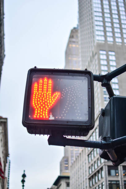 istock Stop walking sign in New York City 653227550