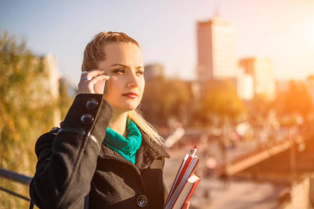istock Businesswoman communicate by cellphone 653227764