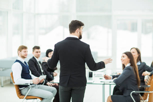 istock CEO speaks at the workshop business team in a modern office 653230766