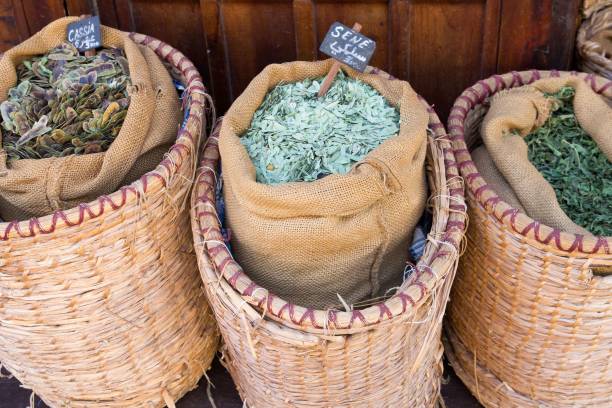 istock Various dry tea leaves on marketplace 653231972