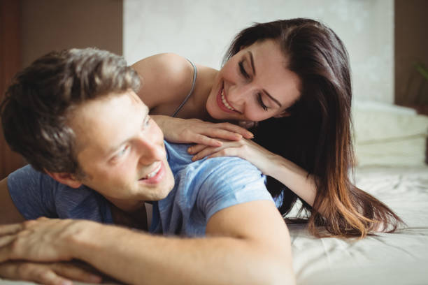 istock Romantic couple relaxing on bed 653251404