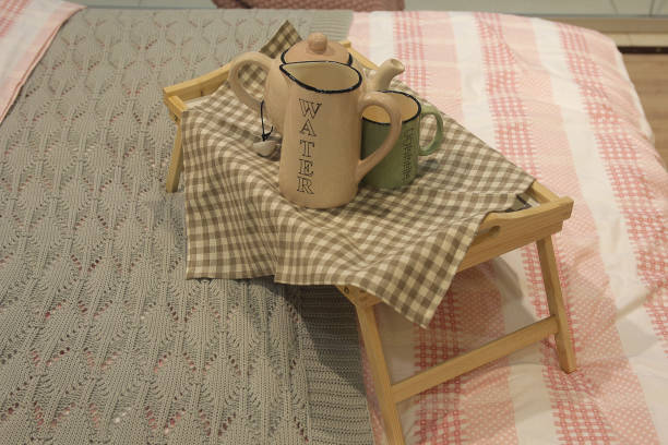istock Wooden tray with coffee and interior decor 653251618