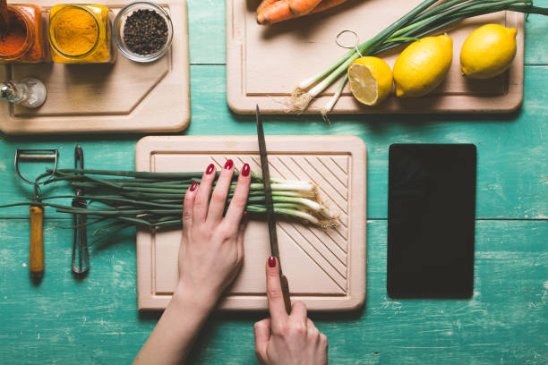 Cutting fresh vegetables stock photo