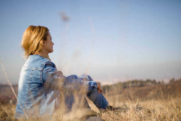 istock Young woman looking at horizon 653254516