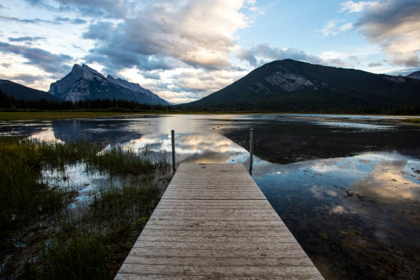 istock Sunset Lake Reflections on The Pier 653254760