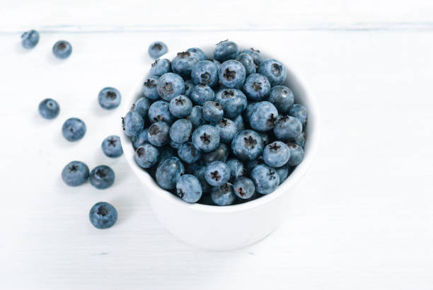 istock Bilberry on white wooden 653258622