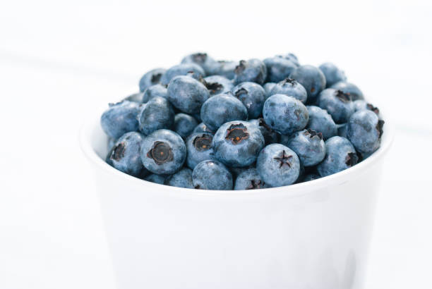 istock Bilberry on white wooden 653260810