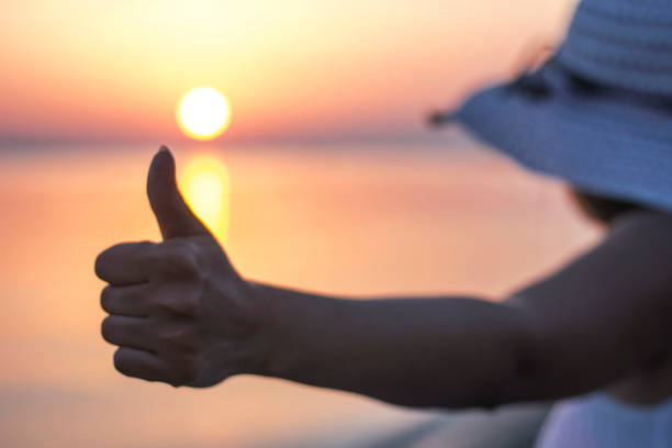 istock Young women on beach - OK 653267236