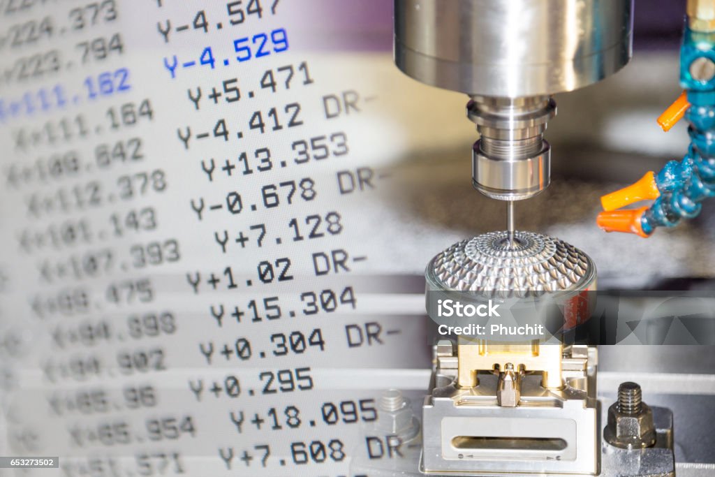 The CNC machine and the NC data scene  use micro cutting process with the sample part Accuracy Stock Photo