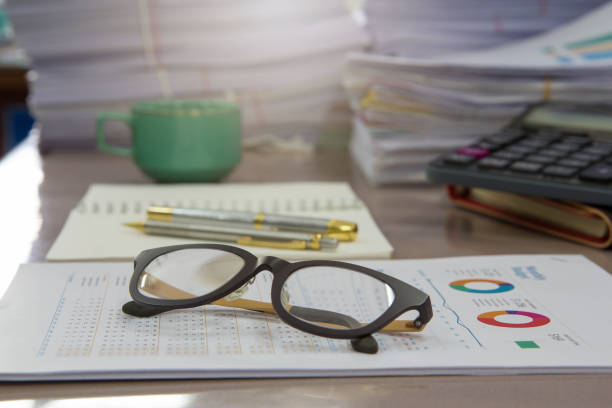 istock Business Concept, Pile of unfinished documents on office desk 653281540