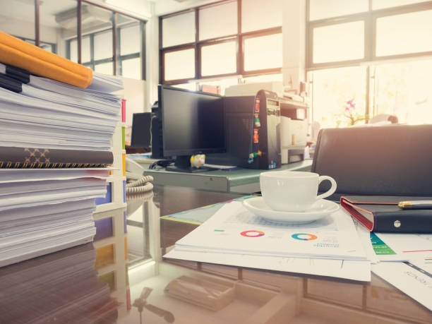 istock Business Concept, Pile of unfinished documents on office desk 653281544