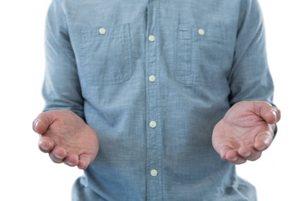 istock Hands of man pretending to hold an invisible object 653284222