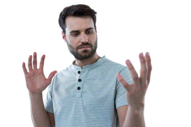 istock Man pretending to hold an invisible object 653284608