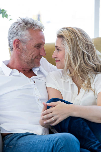 istock Smart mature couple sitting face to face 653287260