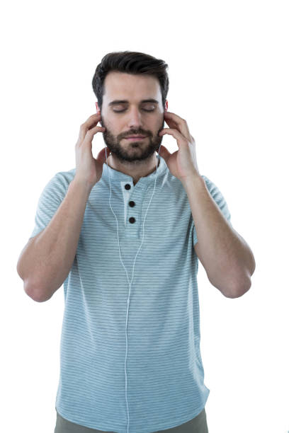 istock Handsome man listening to headphones 653288090