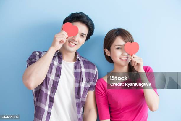 Happy Couple Holding Love Heart Stock Photo - Download Image Now - Chinese Ethnicity, Couple - Relationship, Valentine's Day - Holiday