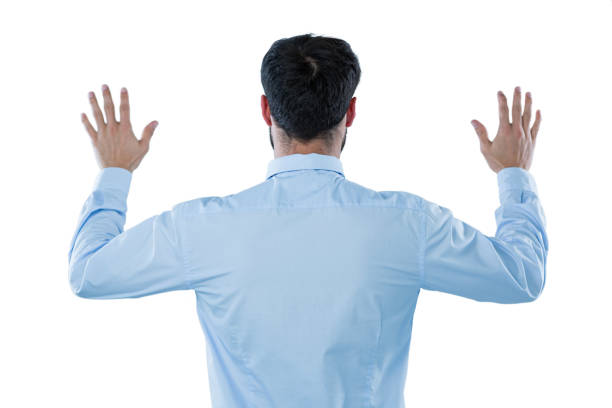 istock Businessman pretending to touch an invisible screen 653296126