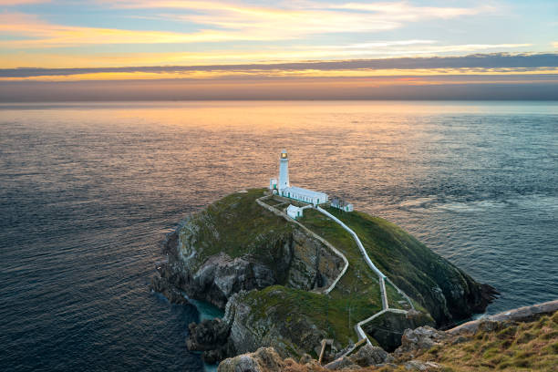 istock South stack lighthouse on Holy Island in Wales at sunset 653319256