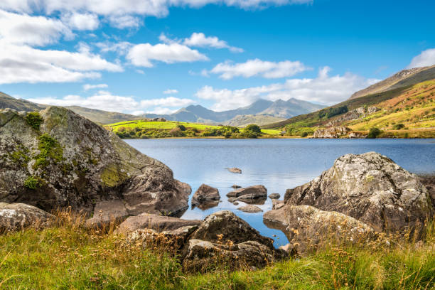 Lake Llynnau Mymbyr in Snowdonia, North Wales View of Snowdon peak from lake Llynnau Mymbyr in Snowdonia National Park, North Wales mount snowdon photos stock pictures, royalty-free photos & images