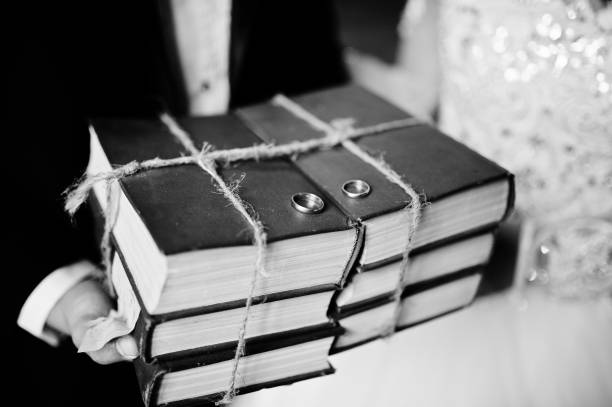 Wedding couple on old wooden library at their wedding day.