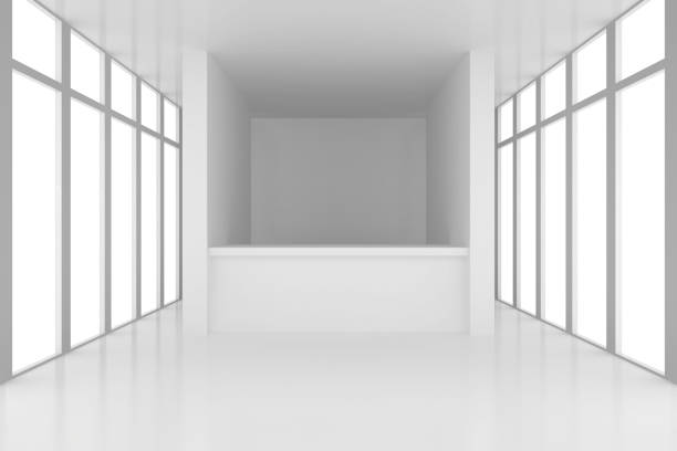 istock reception desk in white room with windows. 653329702