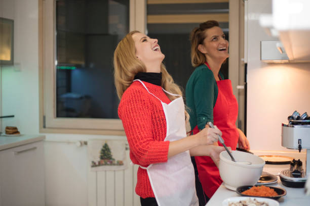 istock Friends cooking at home 653349040