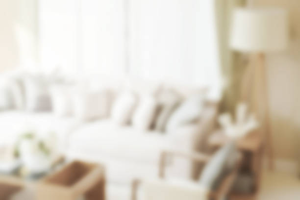 istock blur image of modern living room with sofa and lamp 653349444