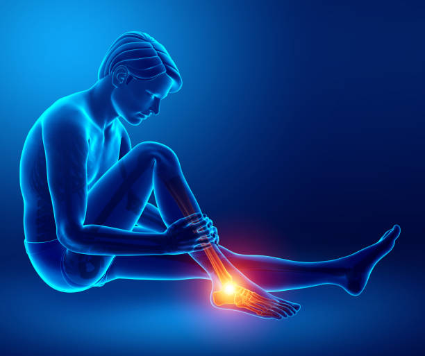 istock Male foot with ankle pain 653352724