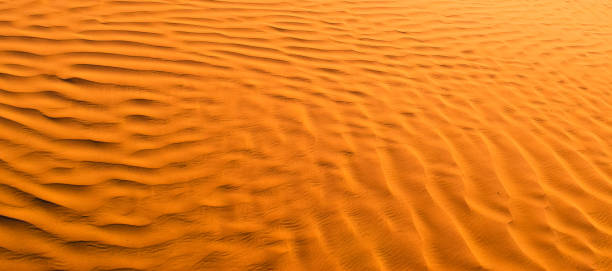 istock Orange Desert Texture, Wallpaper and Background 653356798