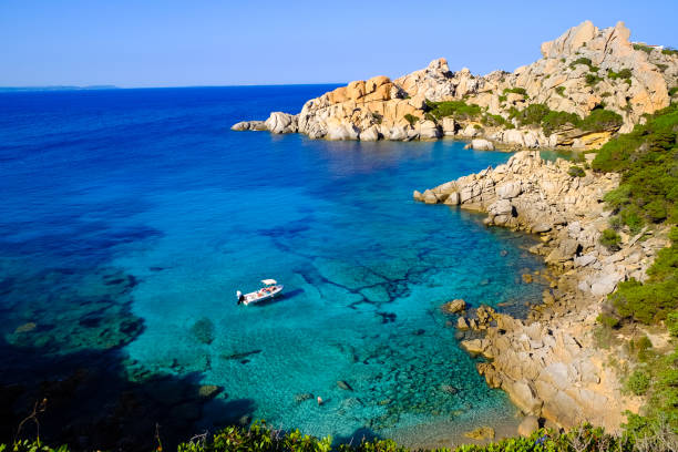 istock Crystal Clear Water and Boat, Sardinia 653365332