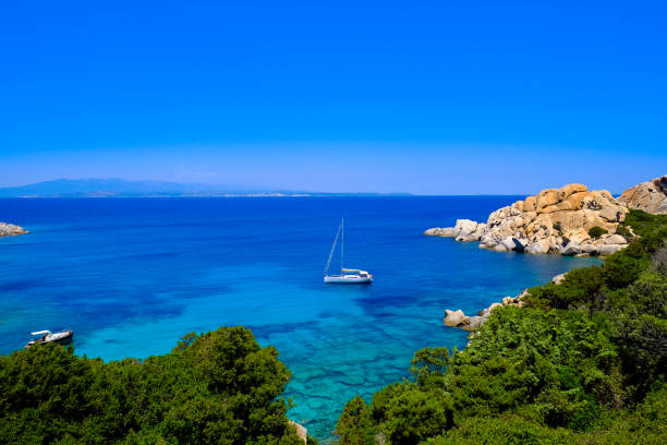 istock Crystal Clear Water and Boat, Sardinia 653367614
