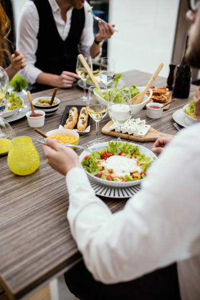 istock Friends having a gluten free dinner. 653375210