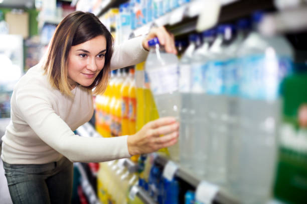 istock female shopper searching for beverages 653385982