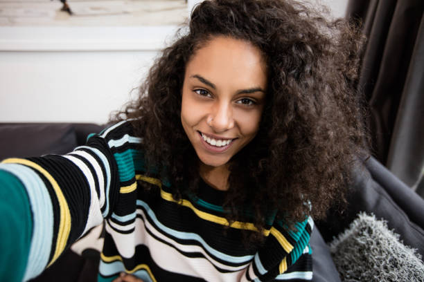 istock Attractive smiling woman taking selife 653387288