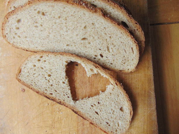 Bread with heart cut out of slice