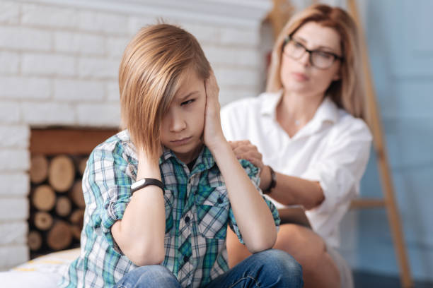 istock Sad teenager covering his ears 653397240